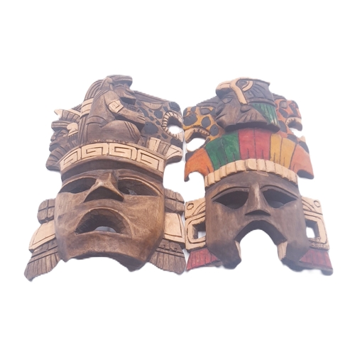 526 - WOODEN 21cm TRIBAL CARVED MASKS (2)