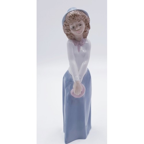 697 - LLADRO (Nao) PORCELAIN Large 24cm CHARACTER FIGURINE OF A YOUNG GIRL WITH HAT AND HOLDING A PINK PUR... 