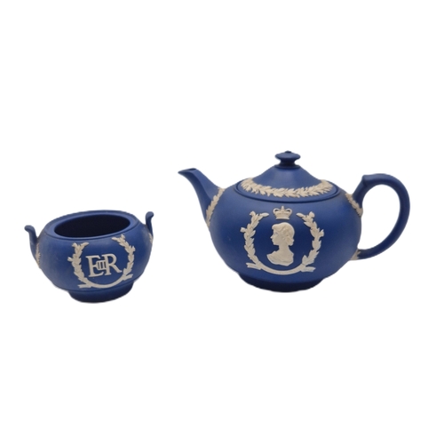 732 - WEDGWOOD DARK BLUE JASPER WARE TEAPOT & SUGAR BOWL.