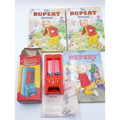 764 - RUPERT BEAR ANNUALS (3) & PETER PAN AUTOMATIC CHOCOLATE MACHINE (Original Box)