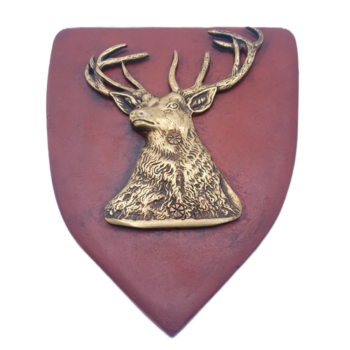 15 - WOODEN 22cm SHIELD DEPICTING A BRASS STAG BUST