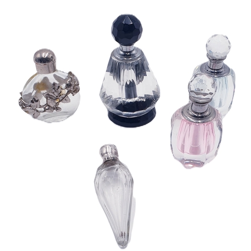 630 - WHITE METAL TOPPED PERFUME BOTTLES (5) ONE HAS A  SILVER TOP (Hallmarked Birmingham 1893) CC May