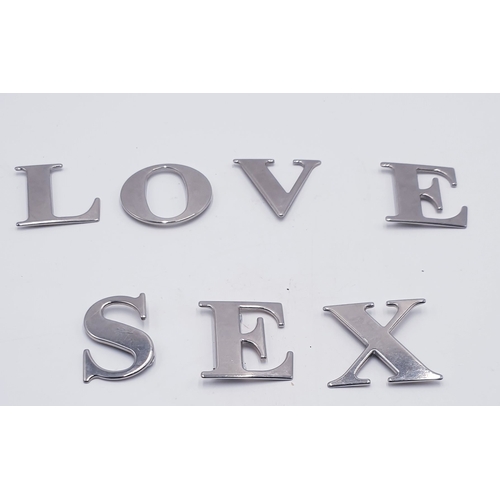 638 - STAINLESS STEEL LETTERS 'LOVE' 'SEX'