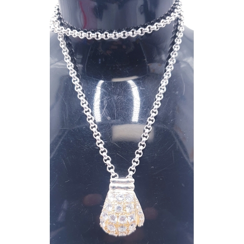 65F - STERLING SILVER /CUBIC ZICONIA PENDANT FASHIONED AS A BOXING GLOVE ON A 40cm NECK CHAIN (Total Weigh... 