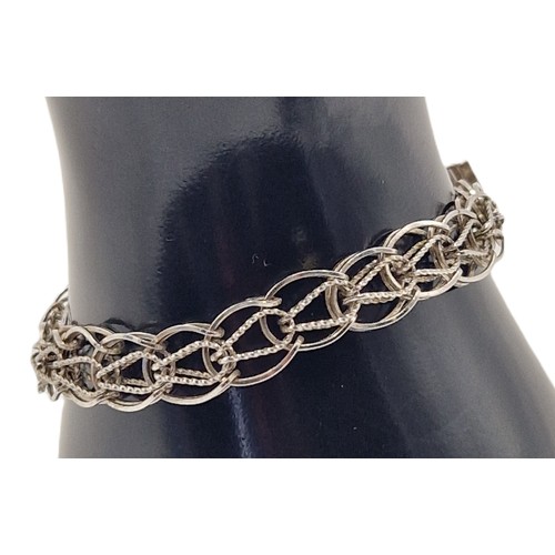 738 - SILVER (Stamped) THREE DIMENSIONAL 18cm BRACELET