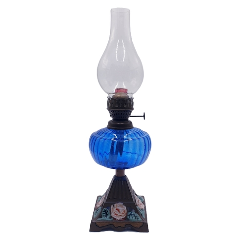 74 - BRISTOL BLUE GLASS OIL LAMP ON CAST METAL STAND (Complete With Funnel)