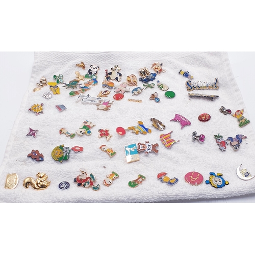 82 - TOWEL CONTAINING OVER 60 PINS Including DISNEY, Etc , (Some Rare Examples)