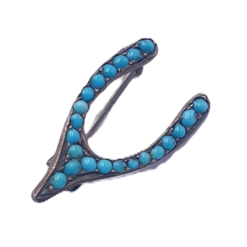 274 - WHITE METAL / TURQUOISE STONE SET VICTORIAN  WISHBONE BROOCH (A.V. On Reverse)