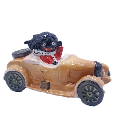 495 - CARLTON WARE GOLLY FIGURINE IN HIS MOTOR CAR