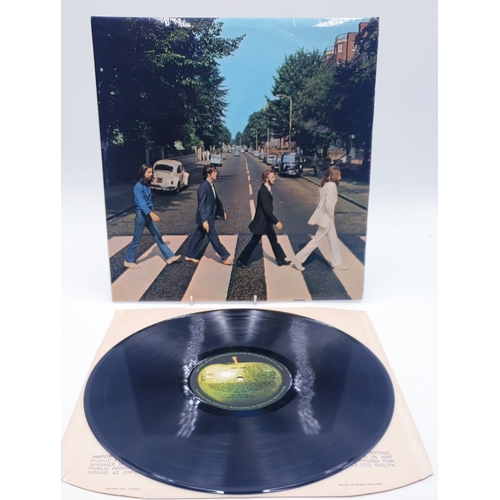 566 - THE BEATLES VINYL ALBUM ABBEY ROAD (Misaligned Apple And Her Majesty Missing Off The Cover) (Rare)