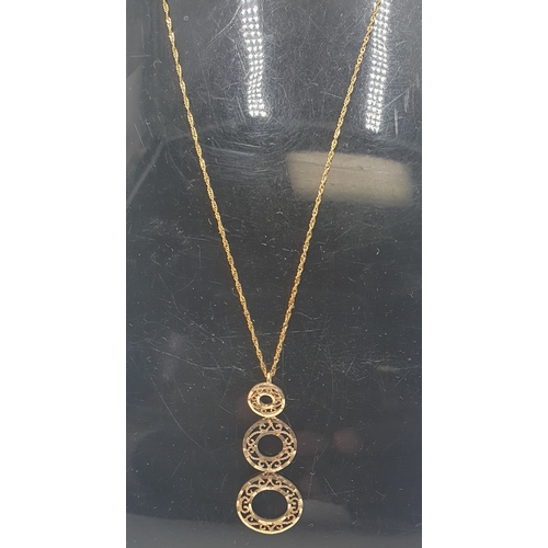 505A - 9ct GOLD (Stamped 375) ORNATE PENDANT ON A 9ct GOLD NECK CHAIN (Total Weight 2.00 Grams)