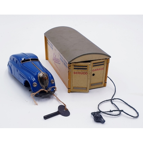 163 - SCHUCO (Germany) TIN PLATE GARAGE Plus SCHUCO (Germany) TIN PLATE MODEL OF A CAR (Working Order)(2 W... 