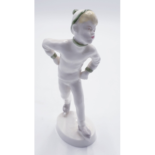 704 - ROYAL WORCESTER CHINA FIGURINE BOY SKATER