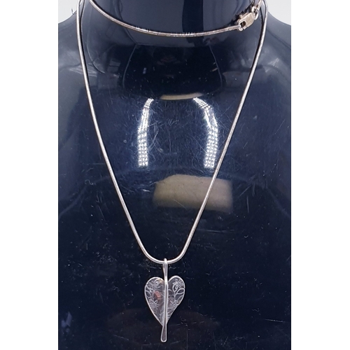 27 - SILVER  LEAF PENDANT ON A SILVER (925) 40cm NECK CHAIN (Total Weight 6 Grams)  (Boxed)