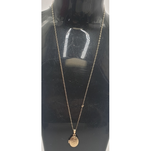 53 - 9ct GOLD LOCKET ON A 40cm 9ct GOLD NECK CHAIN (Total Weight 1.26 Grams)