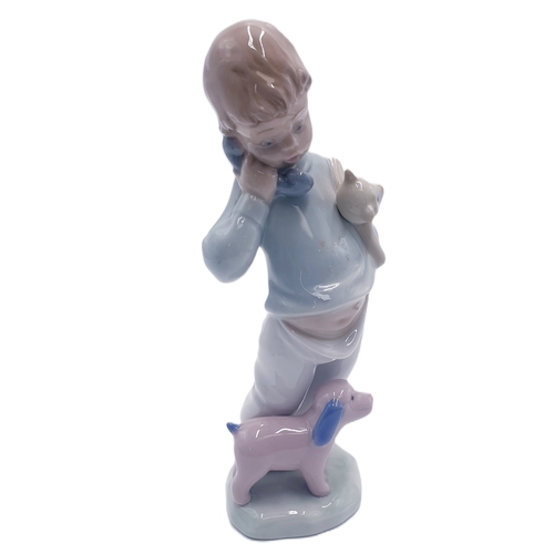 222 - LLADRO (Nao) PORCELAIN 19cm x 8cm CHARACTER FIGURINE OF A YOUNG BOY ON TELEPHONE 