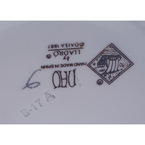 222 - LLADRO (Nao) PORCELAIN 19cm x 8cm CHARACTER FIGURINE OF A YOUNG BOY ON TELEPHONE 