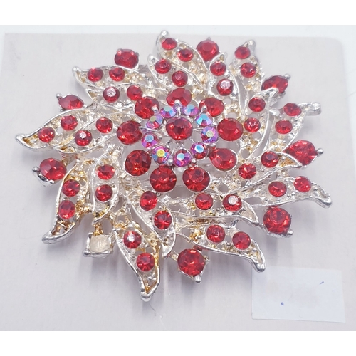 782 - STARBURST RED STONE BROOCH