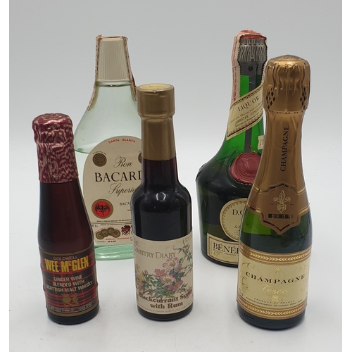 142 - BOTTLES OF GINGER WINE, RUM SYRUP, BACARDI , Etc (5) (All Sealed) .
(Please Note This Lot WILL NOT B... 