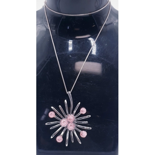 317 - SILVER / PINK STONE SET FLOWER PENDANT ON A SILVER 44cm NECK CHAIN (Total Weight 17.4 Grams)