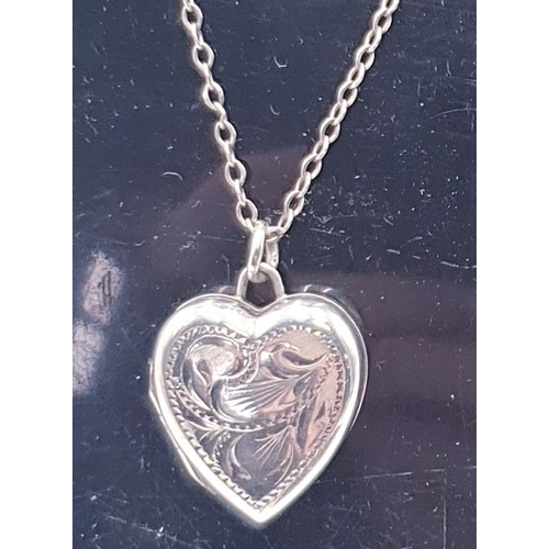 762 - SILVER (925) HEART SHAPED LOCKET ON A SILVER (925) NECK CHAIN (Total Weight 3.8 Grams)