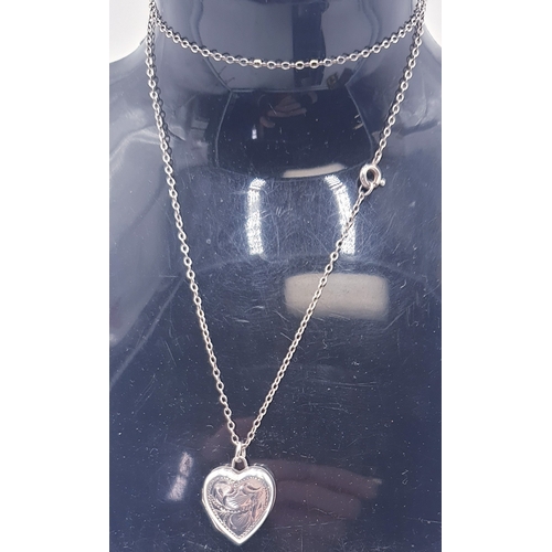 762 - SILVER (925) HEART SHAPED LOCKET ON A SILVER (925) NECK CHAIN (Total Weight 3.8 Grams)