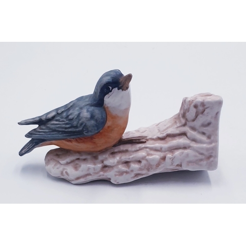 50 - GOEBEL PORCELAIN MODEL OF A BIRD ON A TREE TRUNK