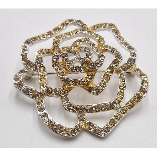 62 - WHITE METAL / STONE SET 4.5cm BROOCH IN THE FORM OF A ROSE (Boxed)