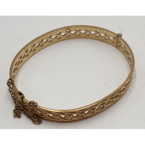 84 - 9ct ROLLED GOLD CELTIC STYLE BANGLE