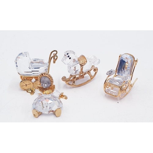 101 - SWAROVSKI CRYSTAL MEMORIES ITEMS (4) INC ROCKING HORSE, ROCKING CHAIR, DOLL & PRAM