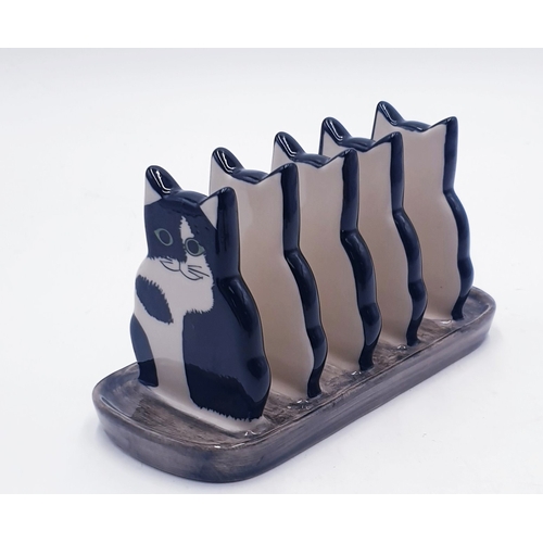 126 - QUAIL POTTERY CAT TOAST RACK