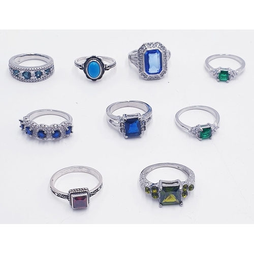 43 - WHITE METAL / SILVER STONE SET RINGS (9)