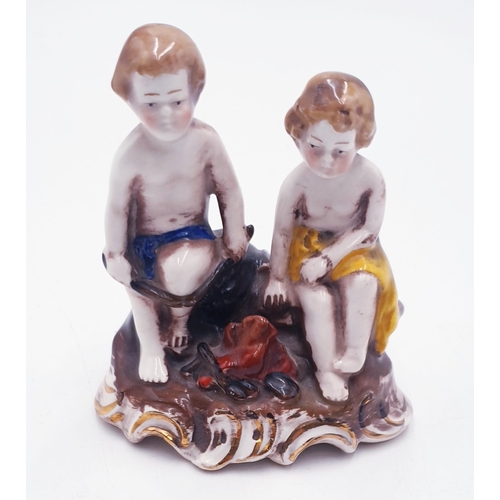 167 - GOEBEL 8cm FIGURINE OF TWO PUTTI c1930s