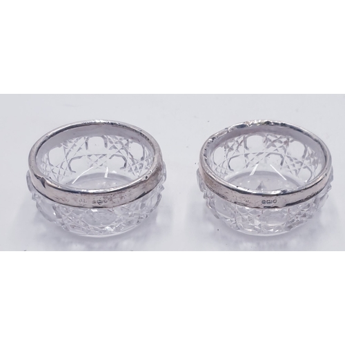 369 - CUT GLASS / STERLING SILVER RIMMED SALTS (2)