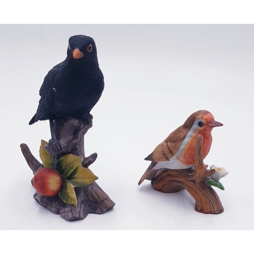 487 - MODELS OF TWO BIRDS