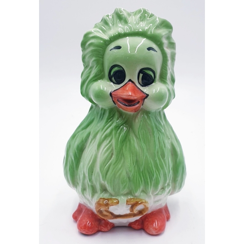 657 - CERAMIC 19cm MONEY BOX FASHIONED AS KEITH HARRIS'S ORVILLE THE DUCK