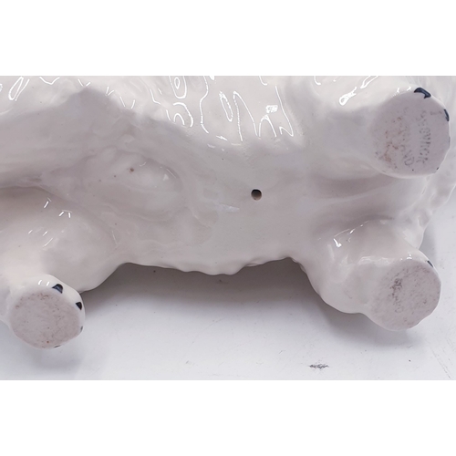 665 - BESWICK MODEL OF A WHITE HIGHLAND TERRIER