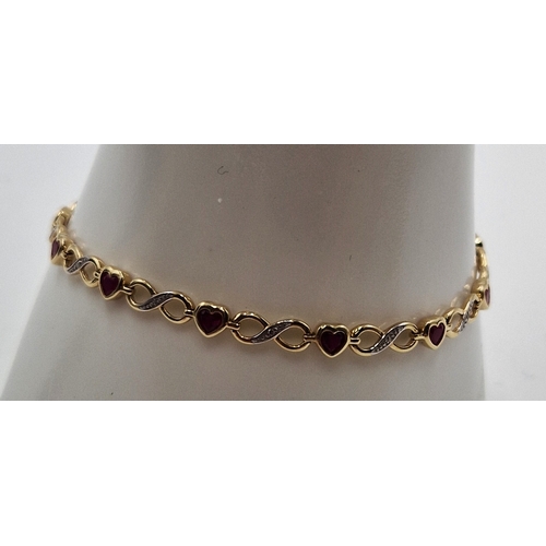 405 - 9ct GOLD (Stamped 375 & Dia) / DIAMOND / RED STONE SET 18cm BRACELET (Total Weight 4.30 Grams) (Boxe... 