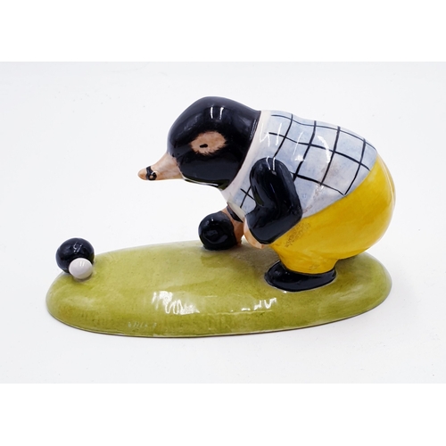 749 - ACORN POTTERY 15cm CHARACTER FIGURINE OF A MOLE PLAYING BOWLS