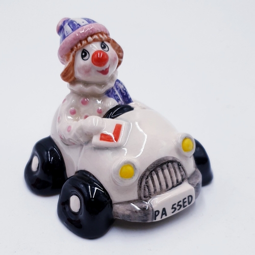 765 - BESWICK MODEL OF A CLOWN IN CAR FROM THE LITTLE LOVABLES SERIES