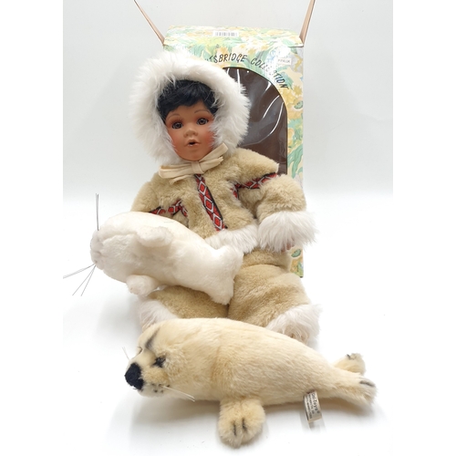 778 - KNIGHTSBRIDGE PORCELAIN ESKIMO DOLL TOGETHER WITH SEAL PUPS (Certificate & Original Box)