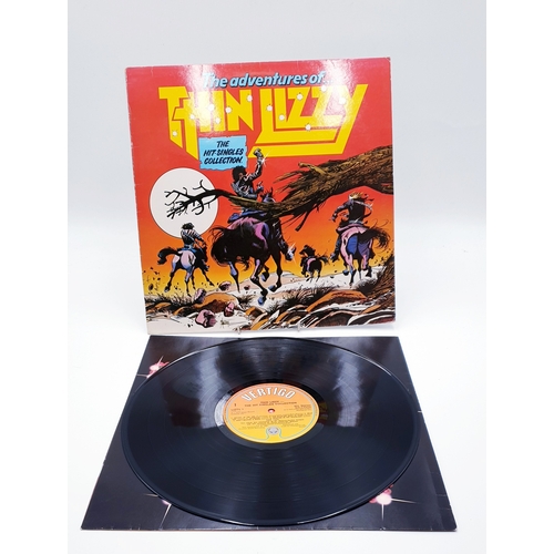 61 - THIN LIZZY VINYL ALBUMS (4)
(Three UK issues Plus One German issue). Fighting (Nice Price reissue), ... 