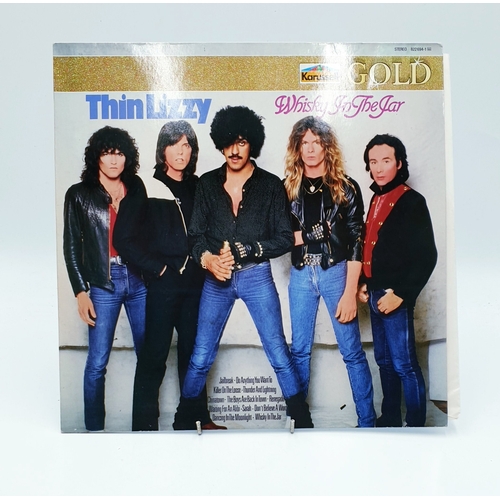 61 - THIN LIZZY VINYL ALBUMS (4)
(Three UK issues Plus One German issue). Fighting (Nice Price reissue), ... 