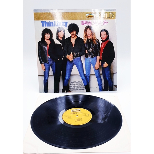 61 - THIN LIZZY VINYL ALBUMS (4)
(Three UK issues Plus One German issue). Fighting (Nice Price reissue), ... 