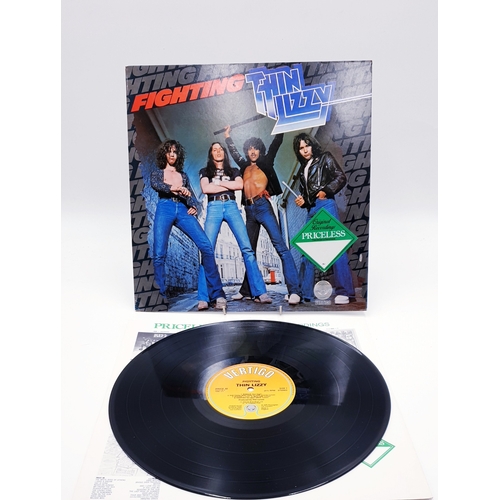 61 - THIN LIZZY VINYL ALBUMS (4)
(Three UK issues Plus One German issue). Fighting (Nice Price reissue), ... 