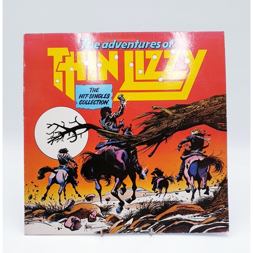 61 - THIN LIZZY VINYL ALBUMS (4)
(Three UK issues Plus One German issue). Fighting (Nice Price reissue), ... 