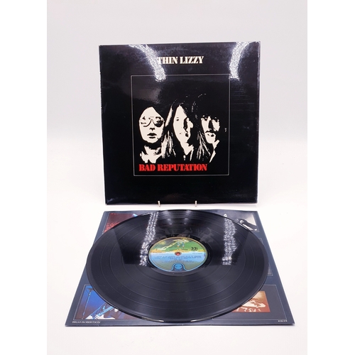 62 - THIN LIZZY VINYL ALBUMS (4)
(Three UK issue Plus One USA issue) Fighting (USA), Bad Reputation + inn... 