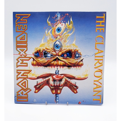 70 - IRON MAIDEN VINYL ALBUM Plus 12 inch (5)
(One Album Plus Four 12 inch).
( Somewhere In Time Lp+ inne... 