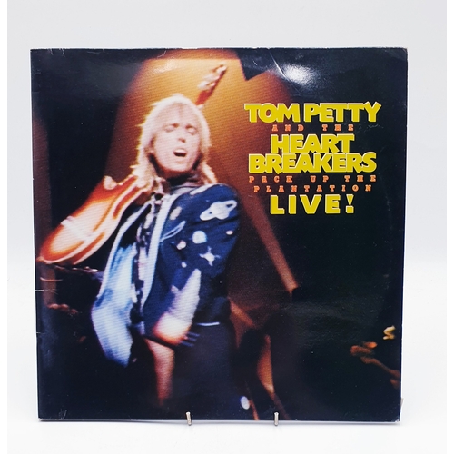 73 - TOM PETTY AND THE HEARTBREAKERS VINYL ALBUM (1)
(Pack Up The Plantation Live! 1985 Gatefold Double L... 