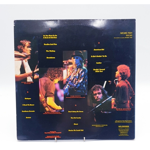 73 - TOM PETTY AND THE HEARTBREAKERS VINYL ALBUM (1)
(Pack Up The Plantation Live! 1985 Gatefold Double L... 